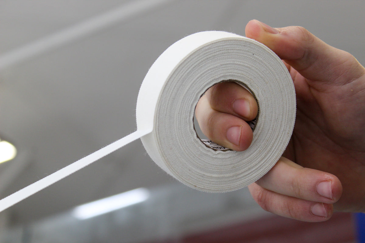 Case of Best Dam white cloth hockey stick tape rolls