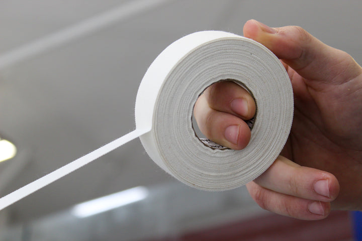 Case of Best Dam white cloth hockey stick tape rolls