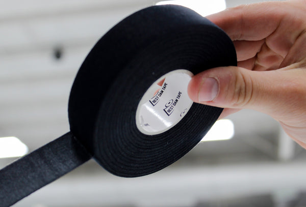 Roll of Best Dam black cloth hockey stick tape