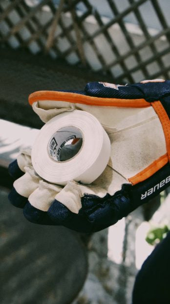 Taping hockey gear