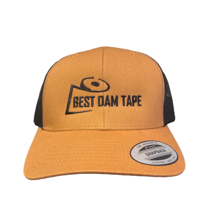 A brown and black snapback hat with the text 'BEST DAM TAPE' stitched on the front.