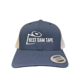Navy blue snapback hat with the text 'BEST DAM TAPE' embroidered on the front.