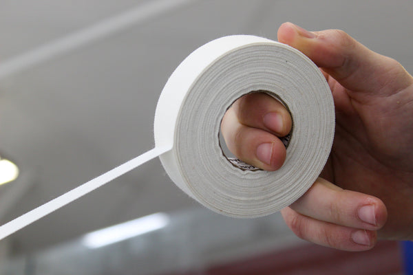 Case of Best Dam white cloth hockey stick tape rolls